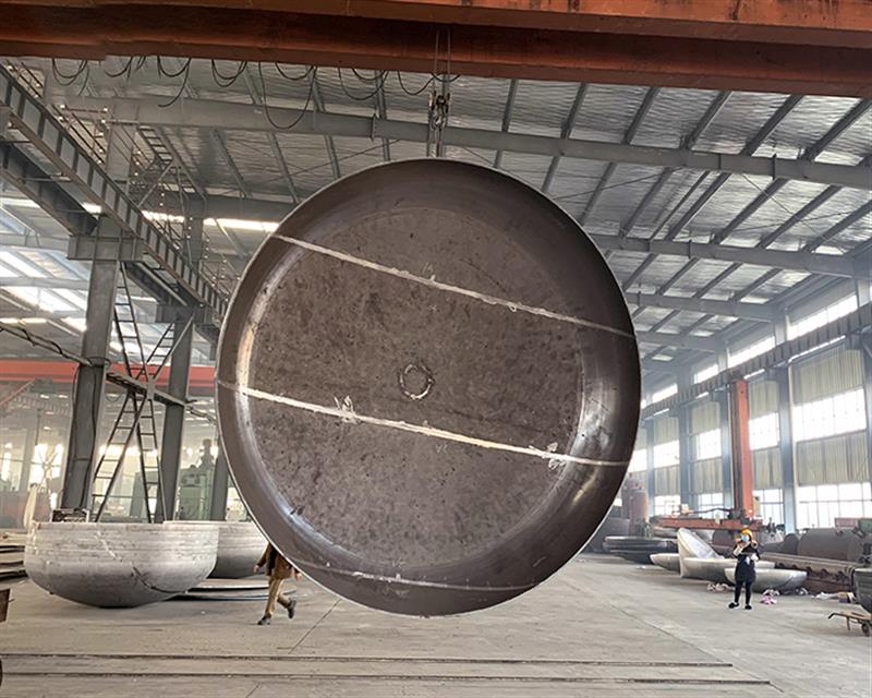 Carbon steel spinning head