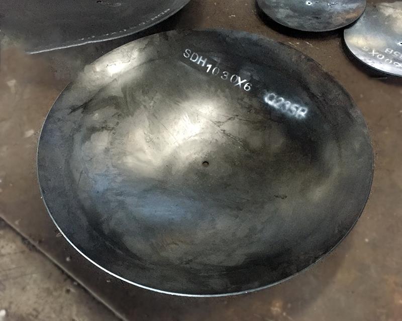 Carbon steel spherical crown head